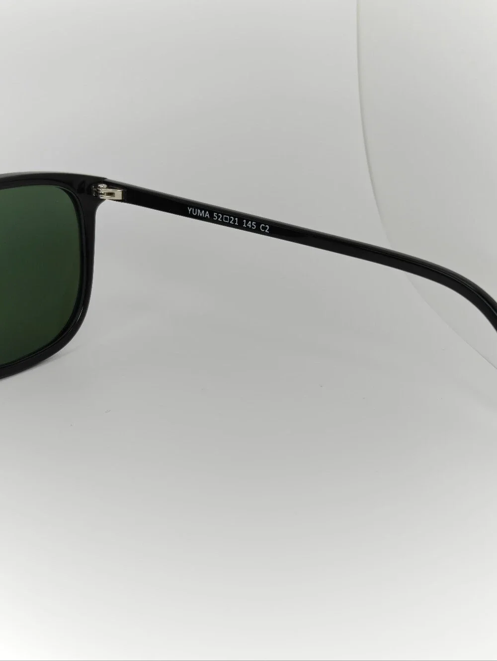 Yuma. Classic Black Frame Gold Bridge. Subtle Lines Rounded Square Frame..